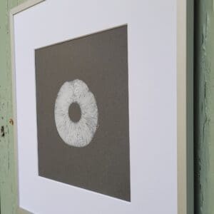 white mushroom spore print on grey