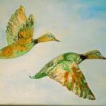 Ducks in flight.