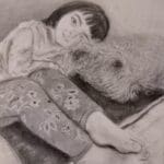 A young girl and her wire-haired Irish Terrier having a cuddle on the couch.