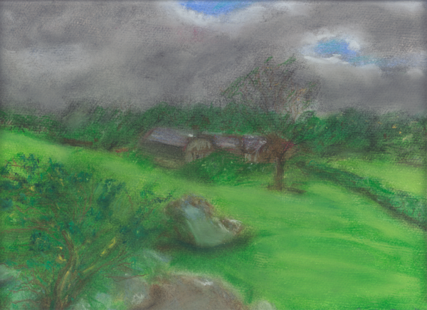 landscape with gray cloun=ds and green fiels