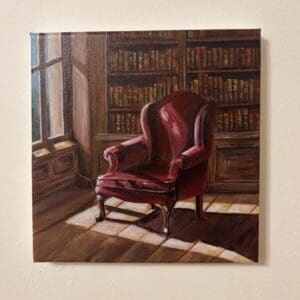 Sunlight, old books and a chair, quietly carrying the absence of someone once there.