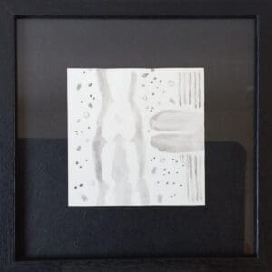 A relaxed monoch summer moment, focusing on the silhouette of a woman.