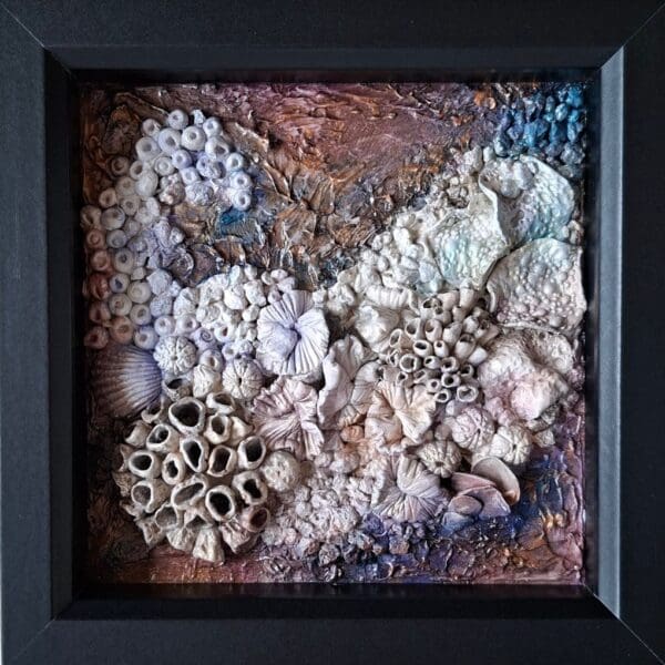 Framed mixed‑media coral artwork “Corals 1” with textured sea‑inspired design in purple and copper tones.