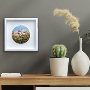 Bouquet of Poppies painting displayed above a wooden console table