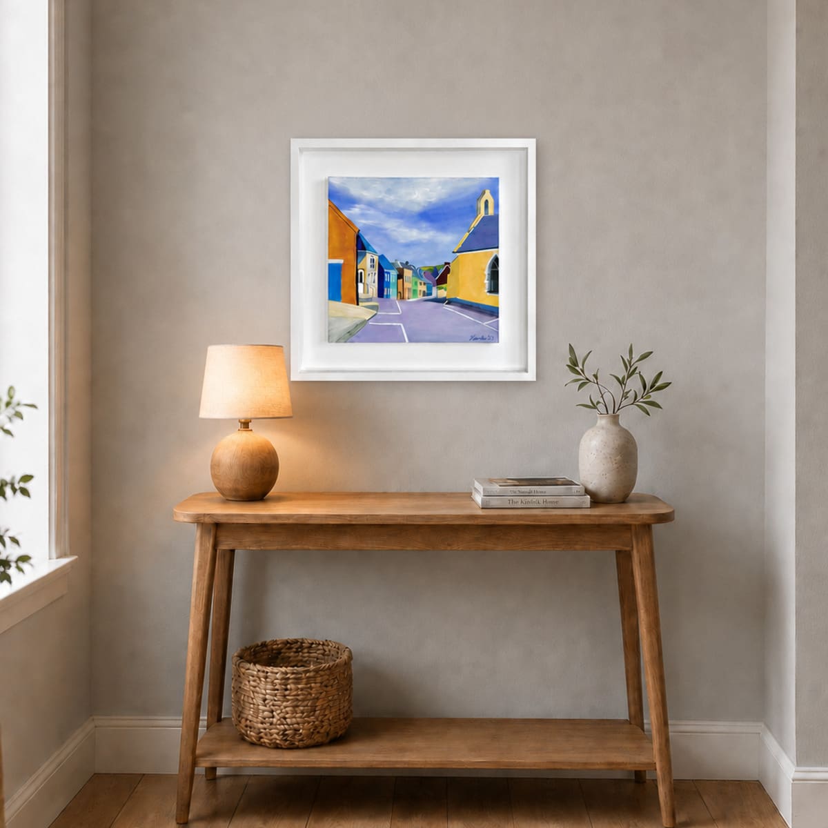 Eyeries Street View painting displayed above a console table in a cosy room